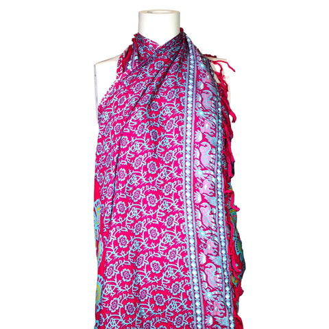 Teal Purple Mandala Sarongs draped on a white mannequin, showing a bright patterned border and fringe