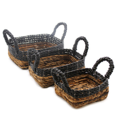 Banana Leaf & Hitam Raffia Square Basket set of three, nested in a diagonal row on white
