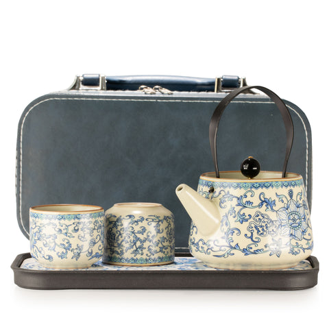 Travel Teapot Set & Two Cups, China Ru Blue, arranged on a tray before its closed case