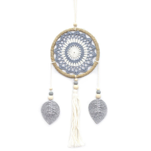 Full grey dream catcher displayed against a plain white background, with leaf-shaped drops and cream tassel