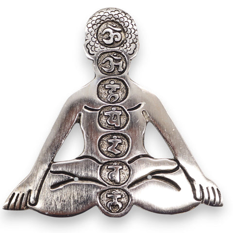 Close-up front view of the silver-toned seven chakra yoga incense holder on a white background