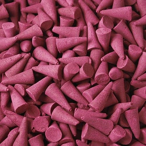 Bulk Incense Cones, Ylang Ylang, a close-up of loose pink cones piled together