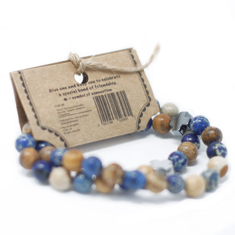 Set of 2 Gemstones Friendship Bracelets, Loyalty, Amazonite & Yellow Jasper, blue and brown beads beside a kraft tag