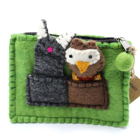 Front view of the green pouch with owl and cat finger puppets, zip and pom-pom visible