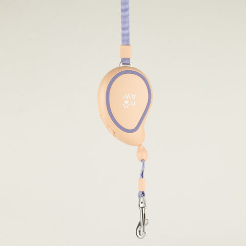 Paw Mini Mango peach retractable lead with lavender trim and wrist strap