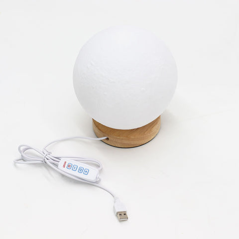New Wave Lamp, USB, 3 settings, Moon, white textured globe on a wooden base with its USB cable