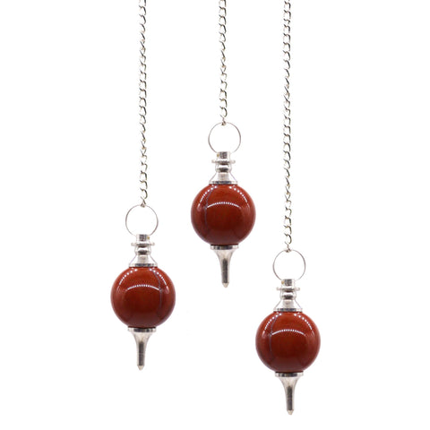 Sphere Pendulums, Red Jasper, three polished red spheres with silver fittings and chains on white