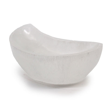 Selenite Moon Bowl shown from the side on a white background, with its curved hollow visible