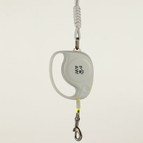 Paw grey retractable dog lead with yellow detailing and rope wrist strap