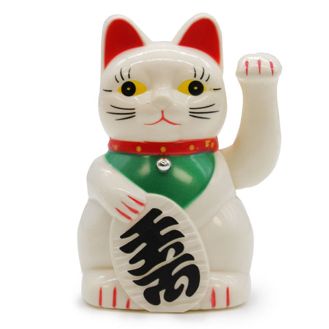 White Money Cat, 15cm, waving cat figurine with a green bib and black lettering, shown from the front