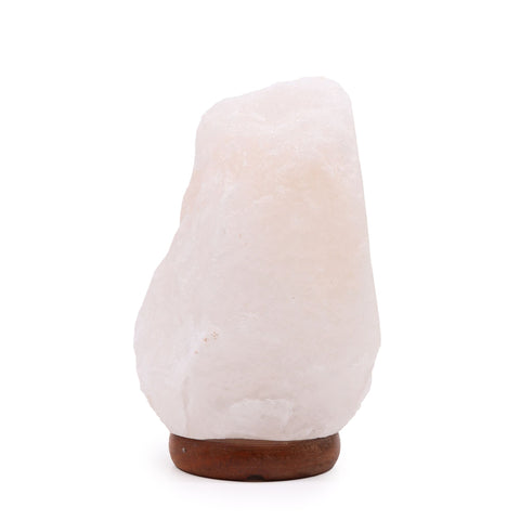 Himalayan salt lamp shown unlit on its brown base against a plain white background