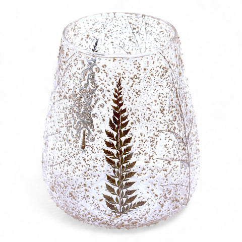 Pino floral glass bowl candle holder on a white background, showing its fern pattern and open top