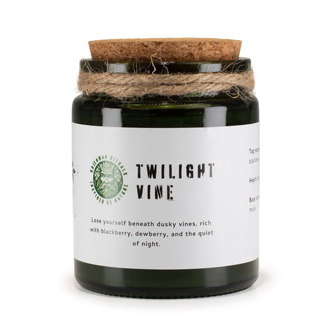 Twilight Vine candle upright against a white background, with its cork lid and twine visible