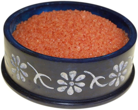 Myrrh Simmering Granules in an open blue-rimmed bowl with a grey floral pattern