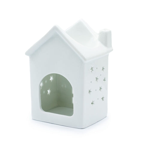 Oil Burner, House Warming, white ceramic house with a roof, chimney and arched opening, angled view