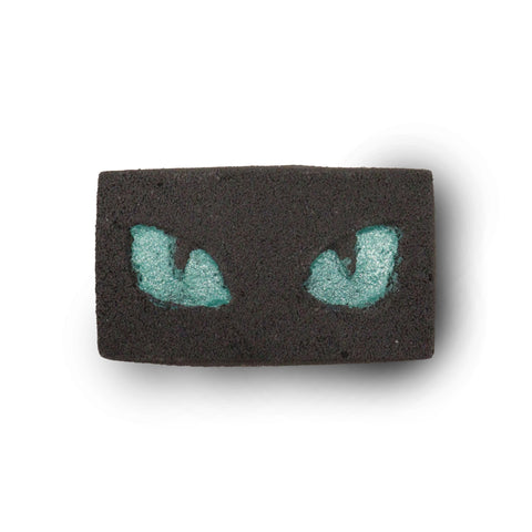 Cats Eyes Halloween Bath Bomb 80g, dark rectangular bath bomb with turquoise cat eyes, shown from the front