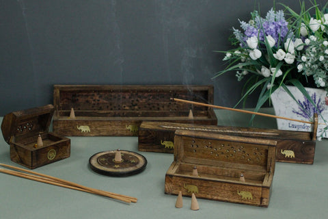 Cone & Stick Burner, Mango Wood in assorted designs, displayed with incense sticks, cones and open boxes