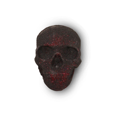 Skull Halloween Bath Bomb 40g, dark skull-shaped bath bomb with red glitter, shown from the front