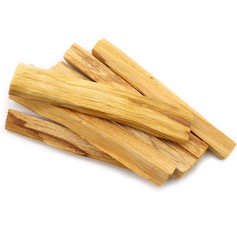 1st Grade Palo Santo Wood Sticks, pale golden wooden sticks arranged in a loose pile on white