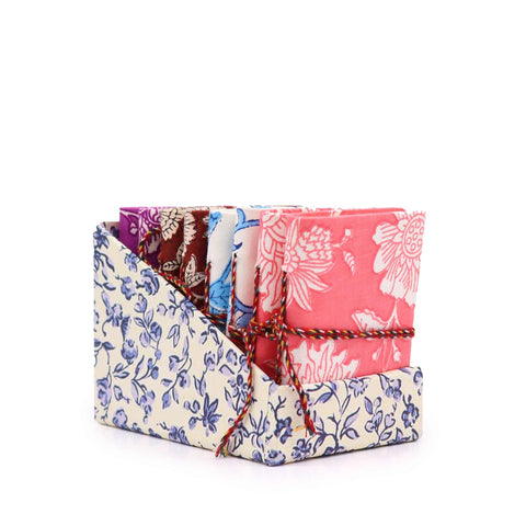 Floral Print Assorted Cotton Bound Notebooks 7x10cm in varied colours, upright in a matching display box