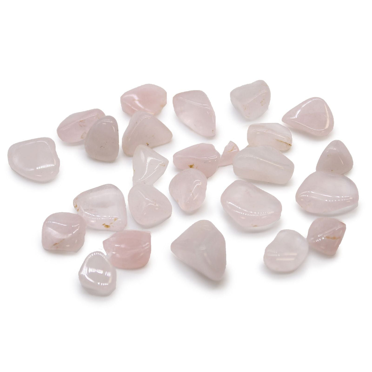 Small pale pink polished stones scattered on a white background.