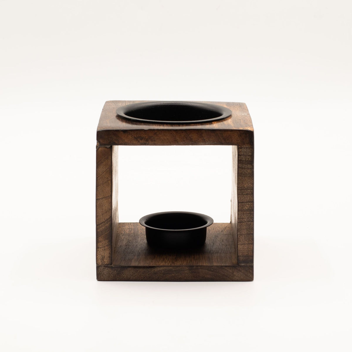 Square mango wood oil burner with a black metal dish set into the top and a black metal tealight holder in the open base