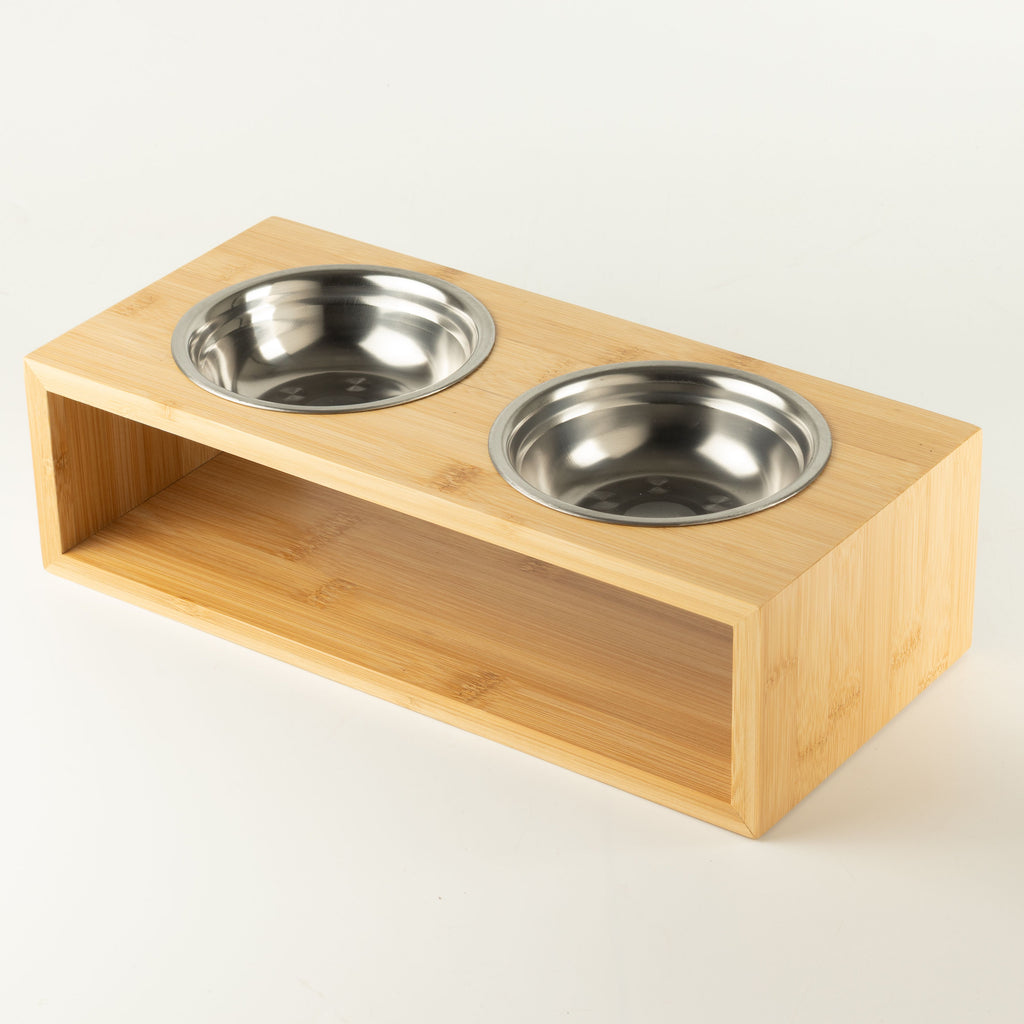 Angled view of the wooden stand with both bowls in place