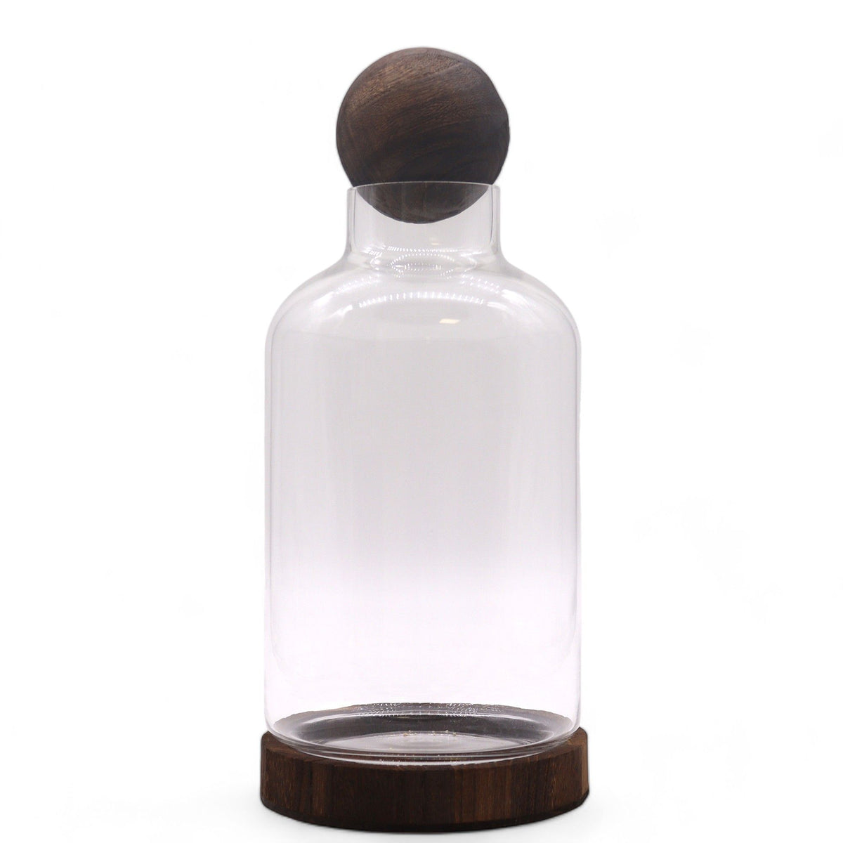 Ball top terrarium assembled with a dark wooden sphere and round wooden base, front view