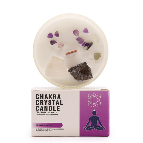 Crown Chakra Crystal Candle with celestite and selenite on top, standing above its box