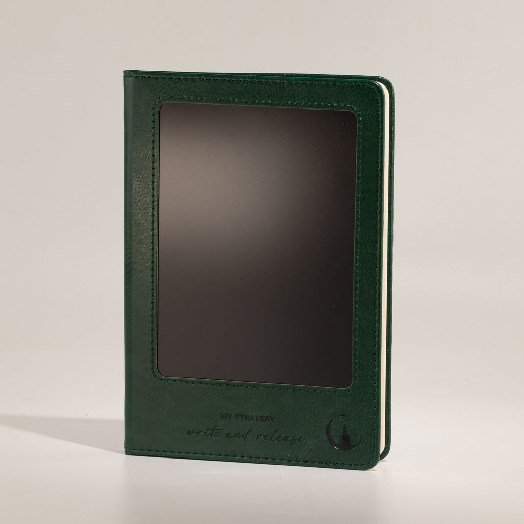 Green notebook standing upright with a blank front screen