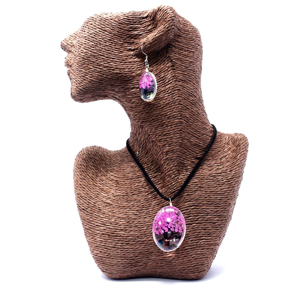 Pressed Flowers Tree of Life set in bright pink on a woven jewellery bust, necklace and earring shown