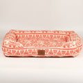 Front view of the red and cream pet bed