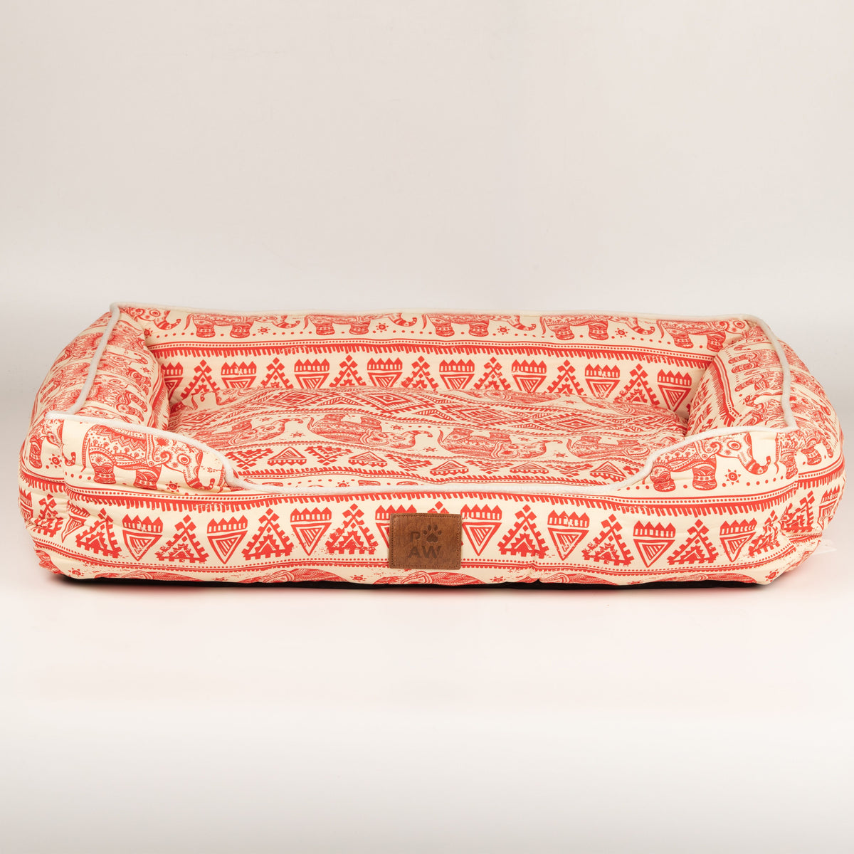 Front view of the red and cream pet bed