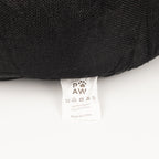 Care label on the underside of the pet bed