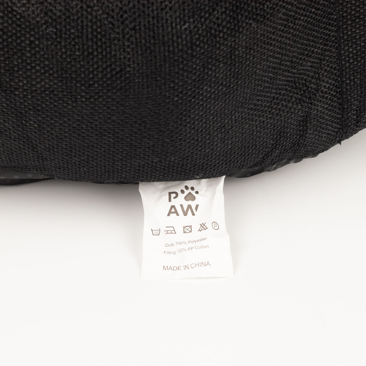 Care label on the underside of the pet bed