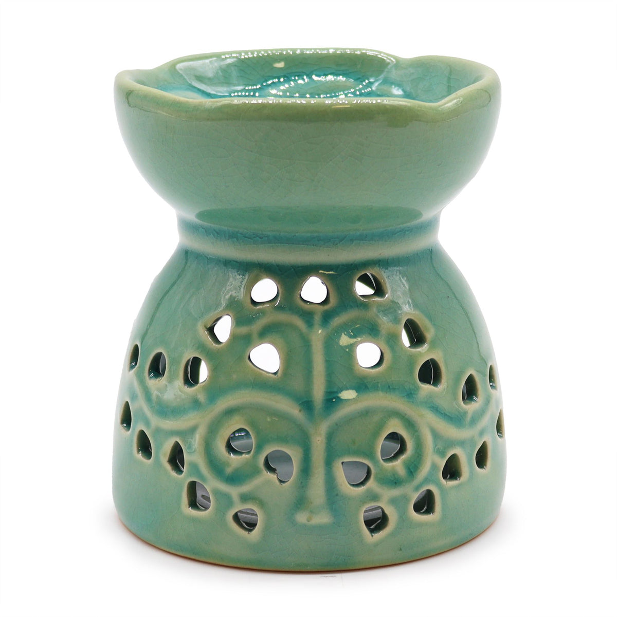 Blue-green Tree of Life oil burner shown from the front, with pierced tree pattern and open top