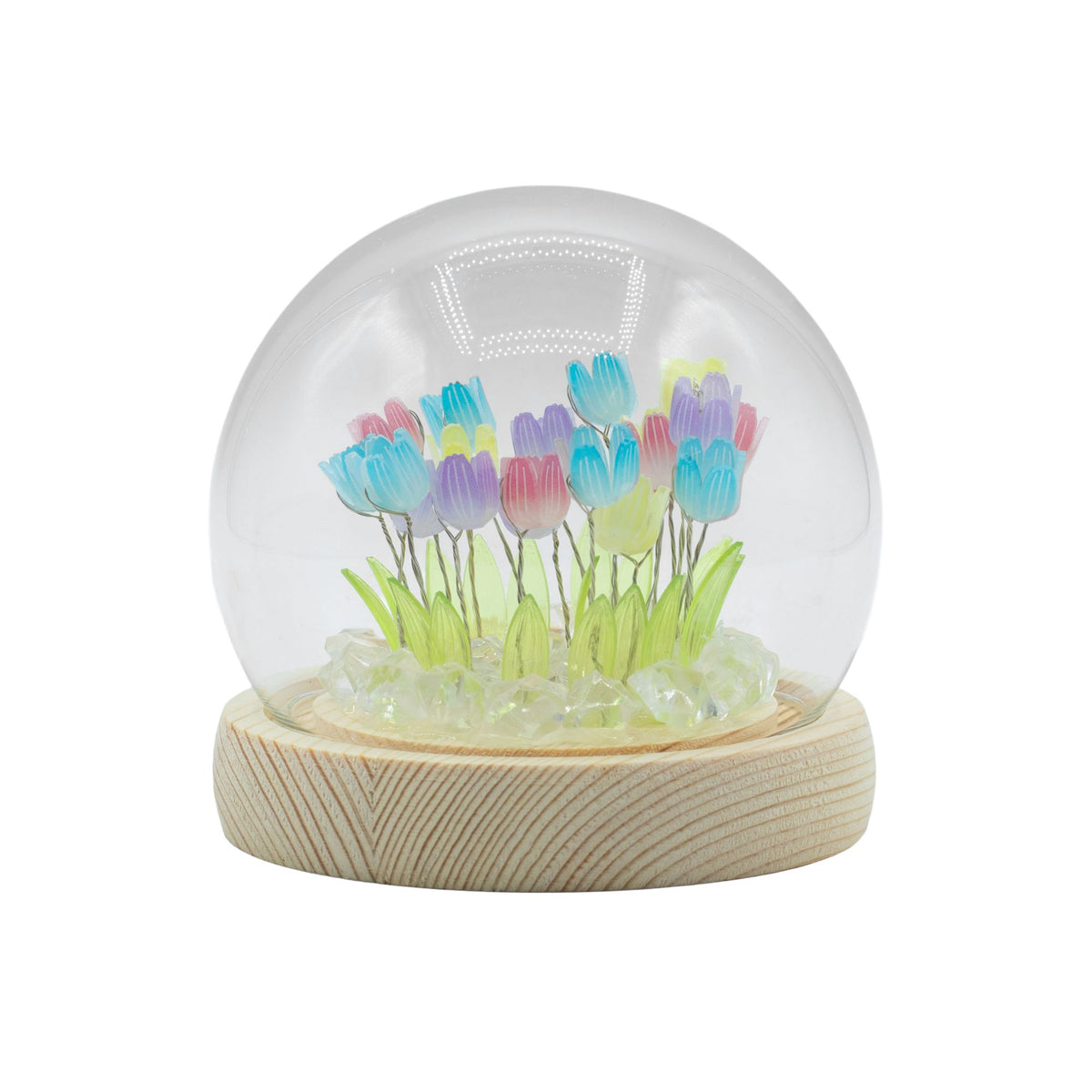 Floral Glow Garden Dome with colourful tulips under a clear glass dome on a pale wooden base