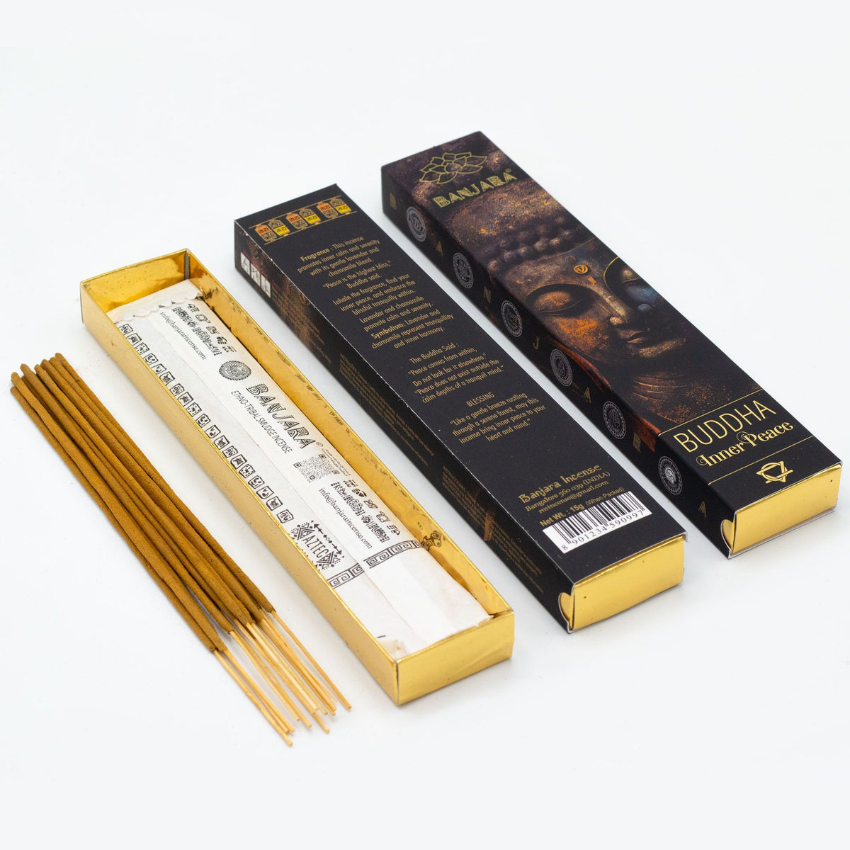 Banjara Buddha, Inner Peace incense sticks beside an open yellow tray and two dark boxes