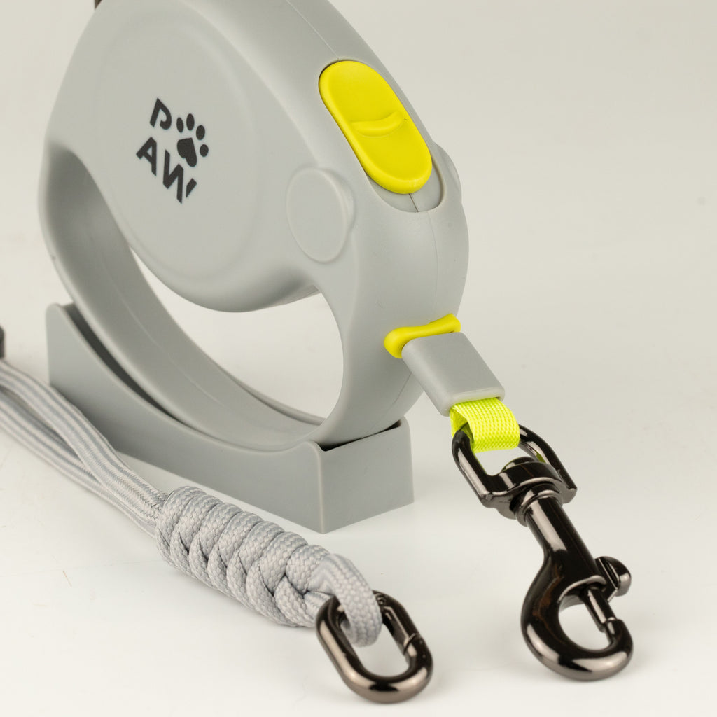 Close-up of the yellow control button and metal clip