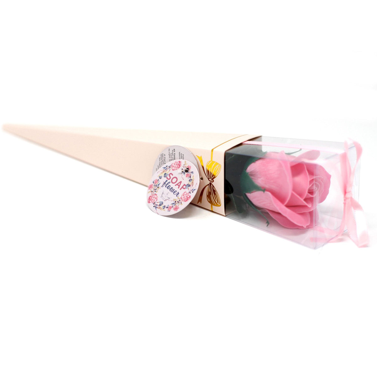 A single wrapped pink soap flower rose in a gift box with ribbon