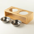PAW double pet bowls with two stainless-steel bowls beside the wooden stand