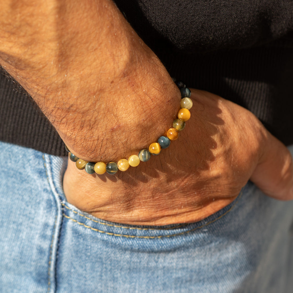 Dream Tigereye bracelet worn with a black sleeve
