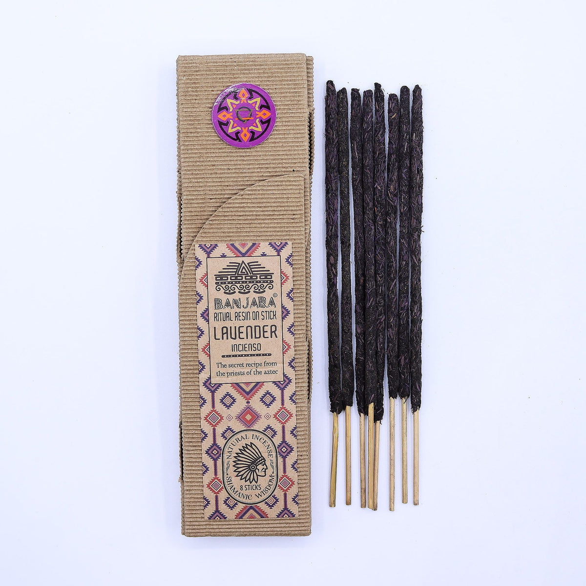Lavender ritual resin sticks beside their ribbed cardboard sleeve on a plain white background