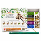 HEM incense collection with a stick resting across the green holder