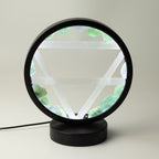 Earth gemstone halo lamp, illuminated with green stones around the circular frame