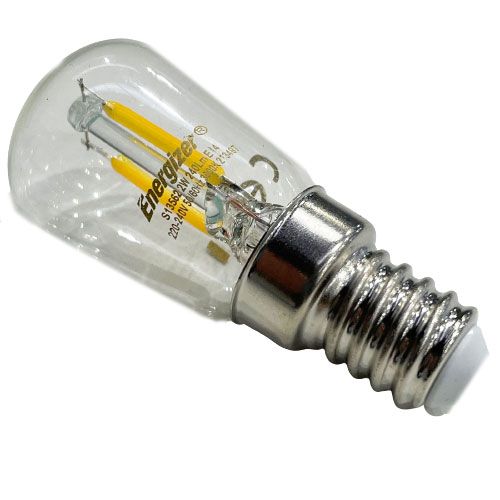 Spare LED bulb close-up, clear glass with yellow filaments and a silver screw fitting