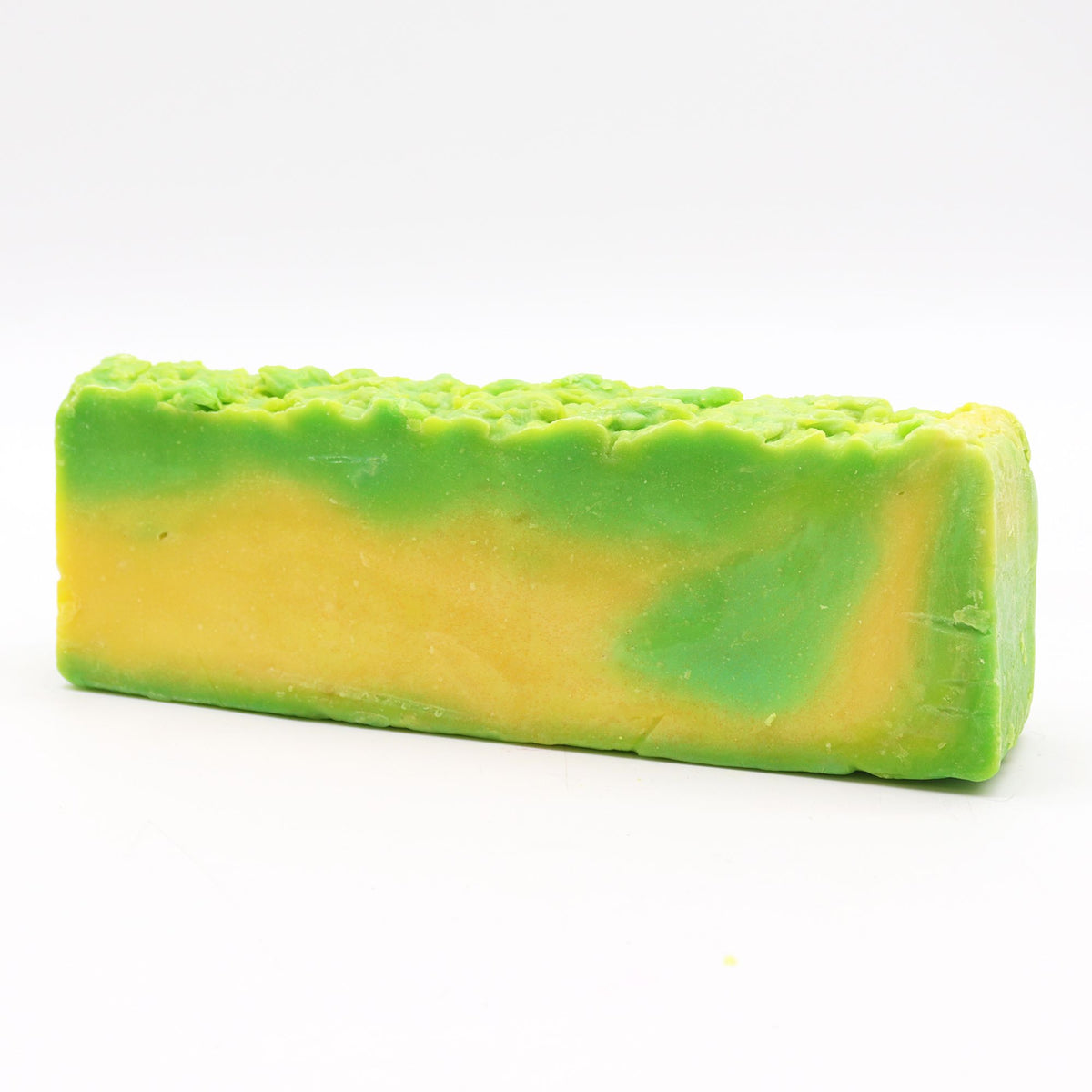 Jojoba, Olive Oil Soap Loaf in a long green and yellow bar, shown from the front
