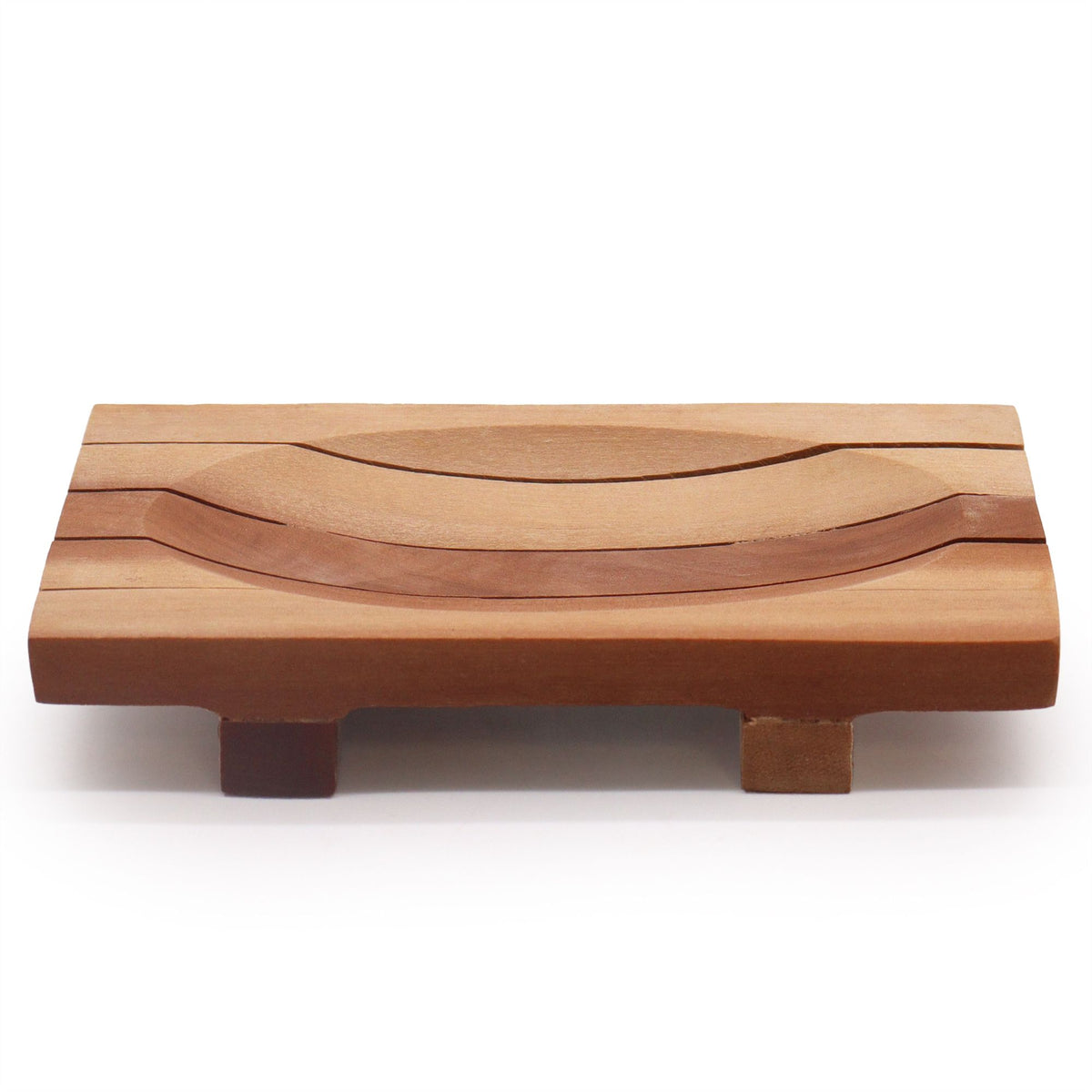 Mahogany soap dish shown low from the front, with raised feet and curved slats across the top