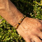 Dream Tigereye bracelet worn on a wrist outdoors