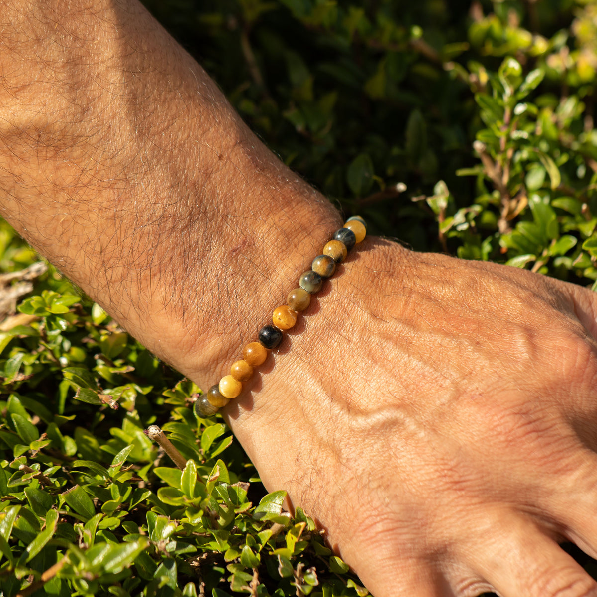 Dream Tigereye bracelet worn on a wrist outdoors